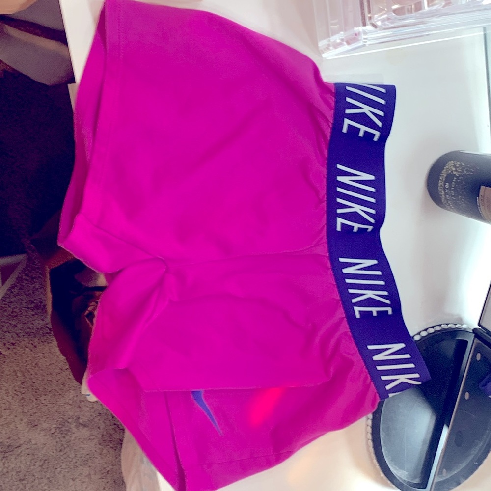 Magenta and plum color Nike pros. (Smoke free household)